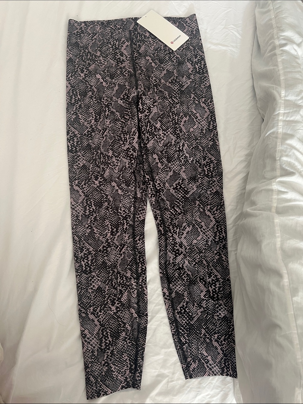 lululemon athletica Snake-Pattern Leggings in Pink & Black size 10
